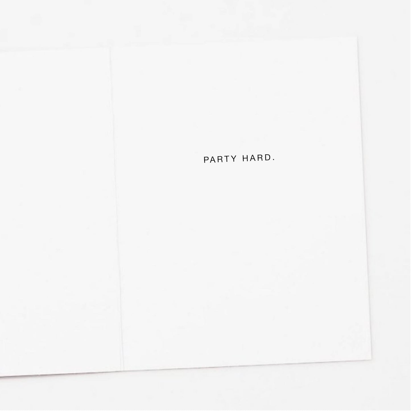 Minimalist design with 'PARTY HARD.' text on a white background