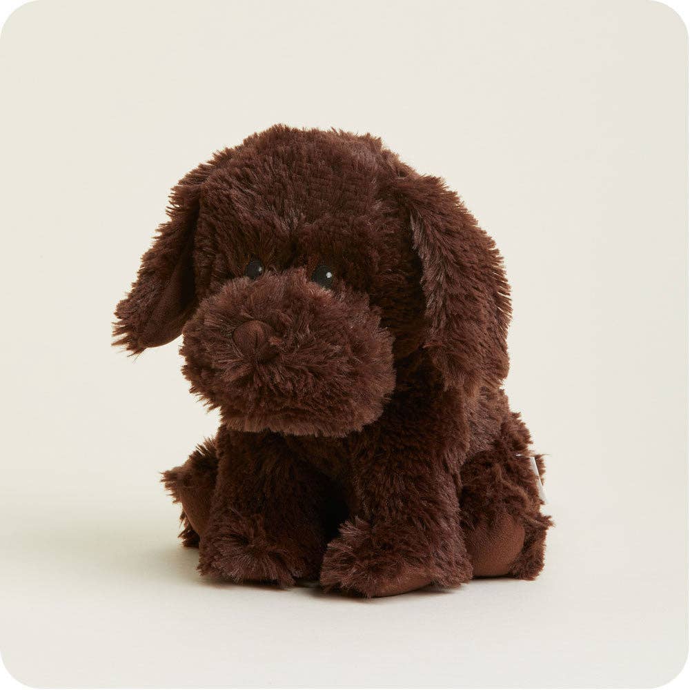Brown plush dog toy on a white background