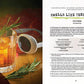 Cocktail in a glass with a garnish on a wooden surface, next to a recipe card for 'Smells Like Teen Spirit(s)' by Nirvana.