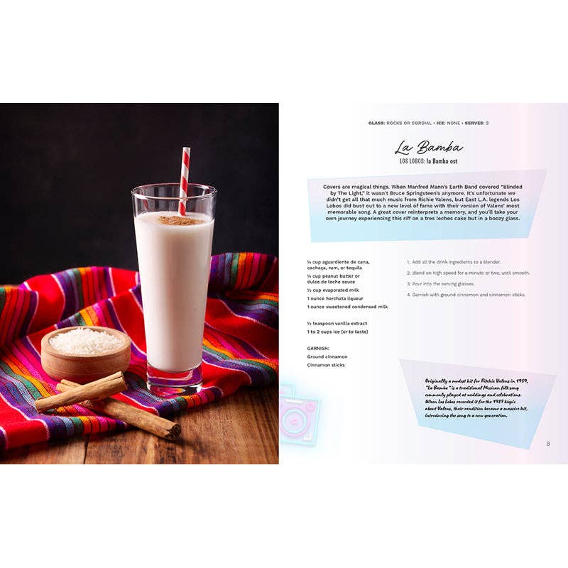 Glass of milkshake with a straw on a colorful cloth next to a recipe card.