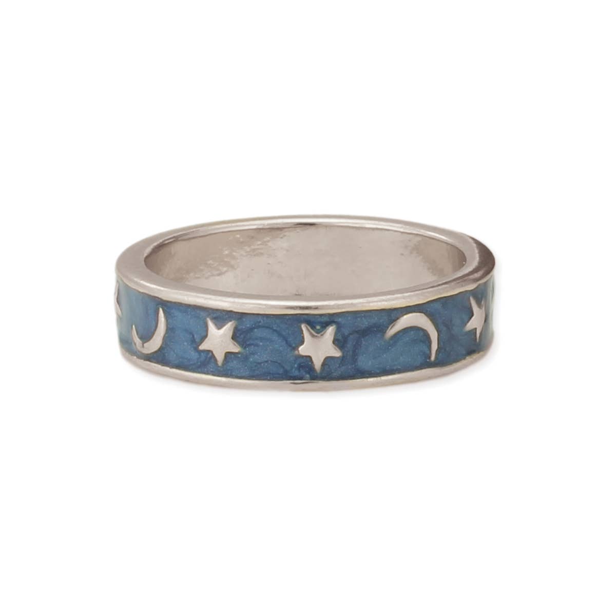 Silver ring with star and moon designs on a blue background