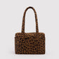 Leopard print totebag on a light gray background