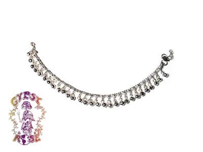 Silver bangle with colorful beads on a white background