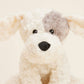 Close-up of a plush dog toy with a neutral background