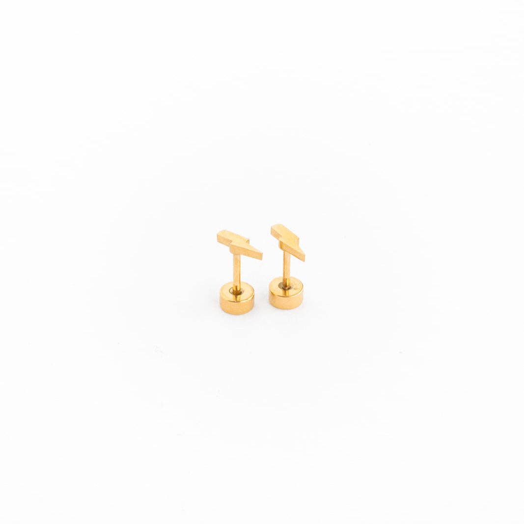 Pair of gold lightening earrings on a white background