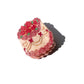 Decorative cake hair claw with red and pink icing on a white background