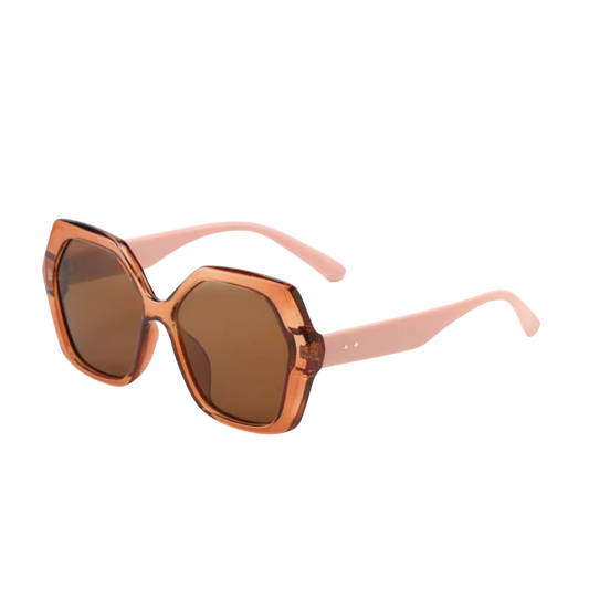 Sunglasses with a brown lens and pink frame on a white background