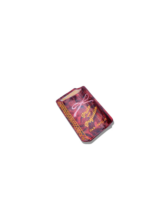 small book hair claw that says "Pride and Prejudice" on a white background