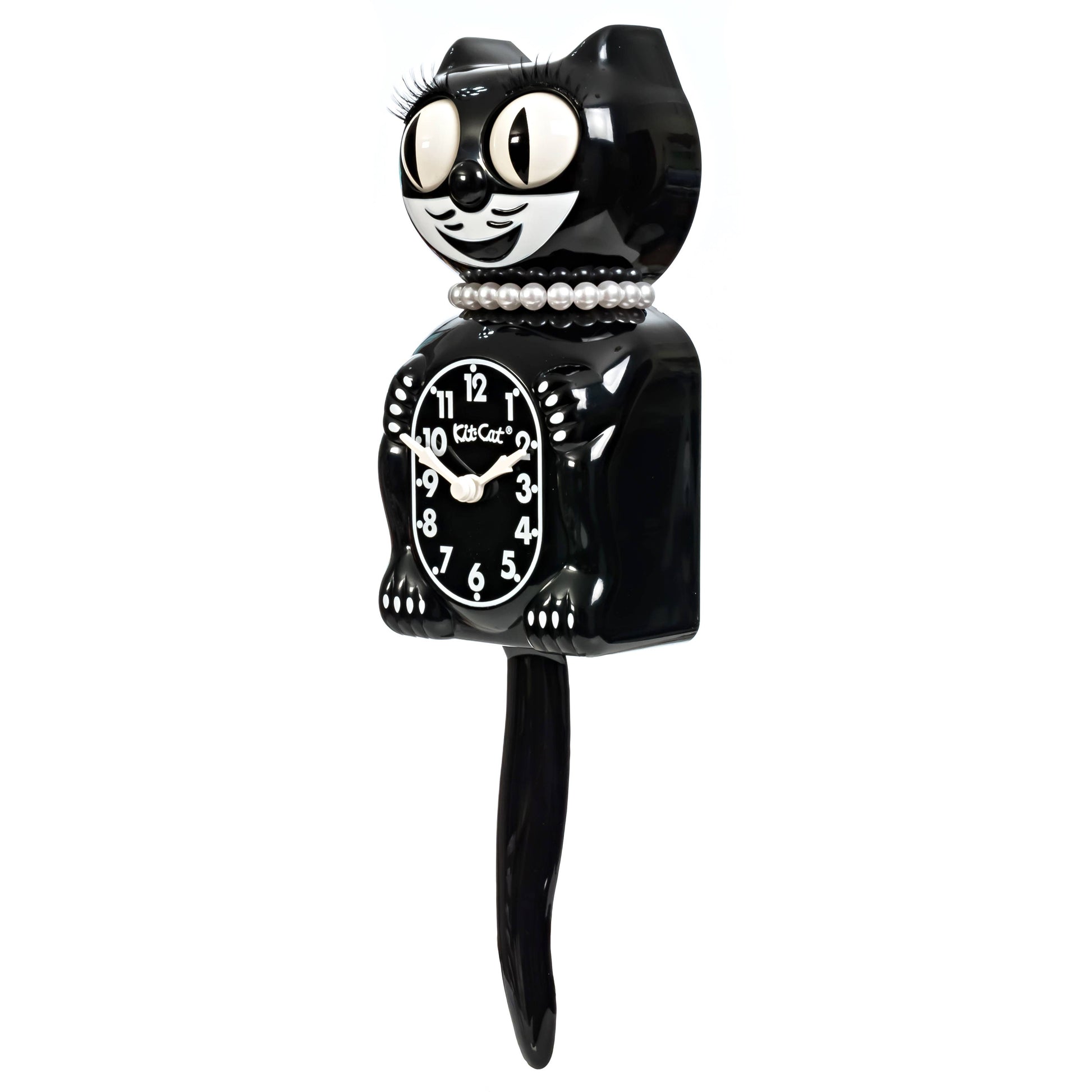 Black cat-shaped clock with pearls and white face on a white background