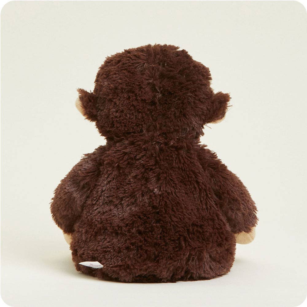 Brown plush toy on a white background