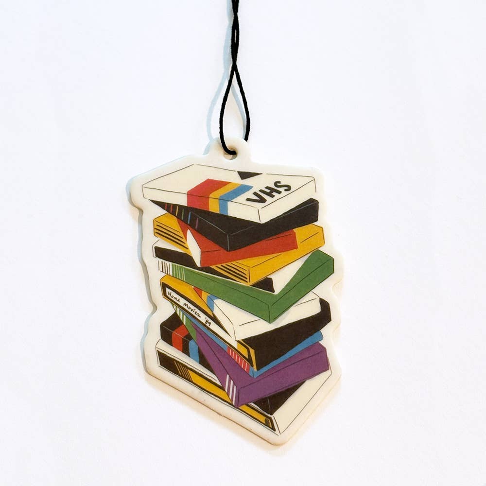 Colorful VHS tape air freshener on a white background