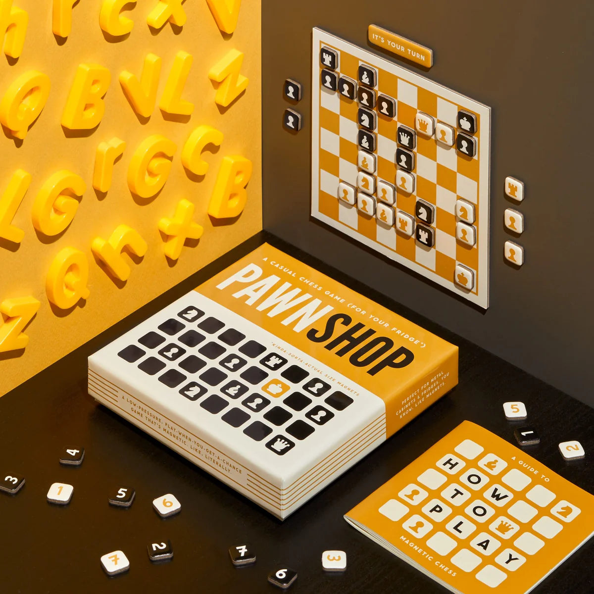 Board game set with 'Pawn Shop' box, dice, and game pieces on a brown background