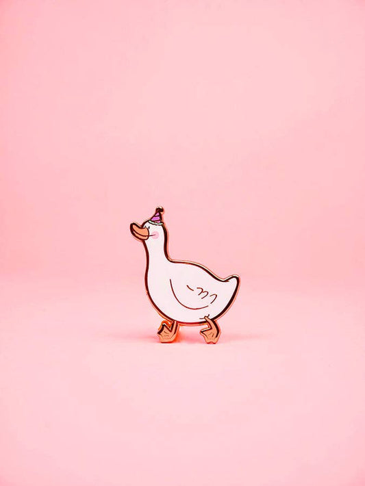 Cartoon goose pin on a pink background